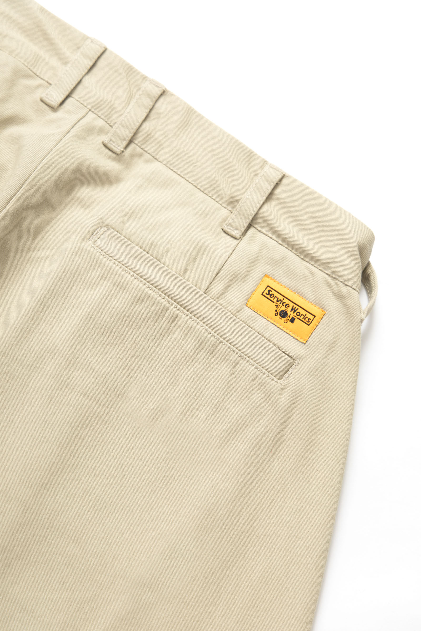 Service Works Drill Part Timer pants in khaki showing branded yellow label detail on workwear trousers