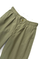 Service Works Drill Part Timer pants in olive flat lay second angle showing pleated balloon fit workwear design
