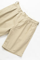 Service Works Drill Part Timer shorts in khaki flat lay showing pleated workwear design