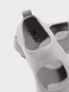 Close-up detail of Tabi Sandal Grey showing logo, split-toe knit upper and lightweight breathable construction.