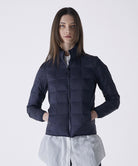 Model wearing Taion Hi Neck W-Zip Down Jacket in Navy