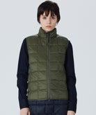 Model wearing Taion Hi Neck W-Zip Down Vest in D.Olive