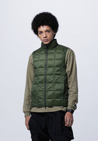 Model wearing Taion Hi Neck W-Zip Down Vest in D.Olive
