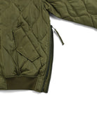 Side slit zipper detail of Taion Military MA-1 Type Down Jacket in Black for improved mobility and comfort