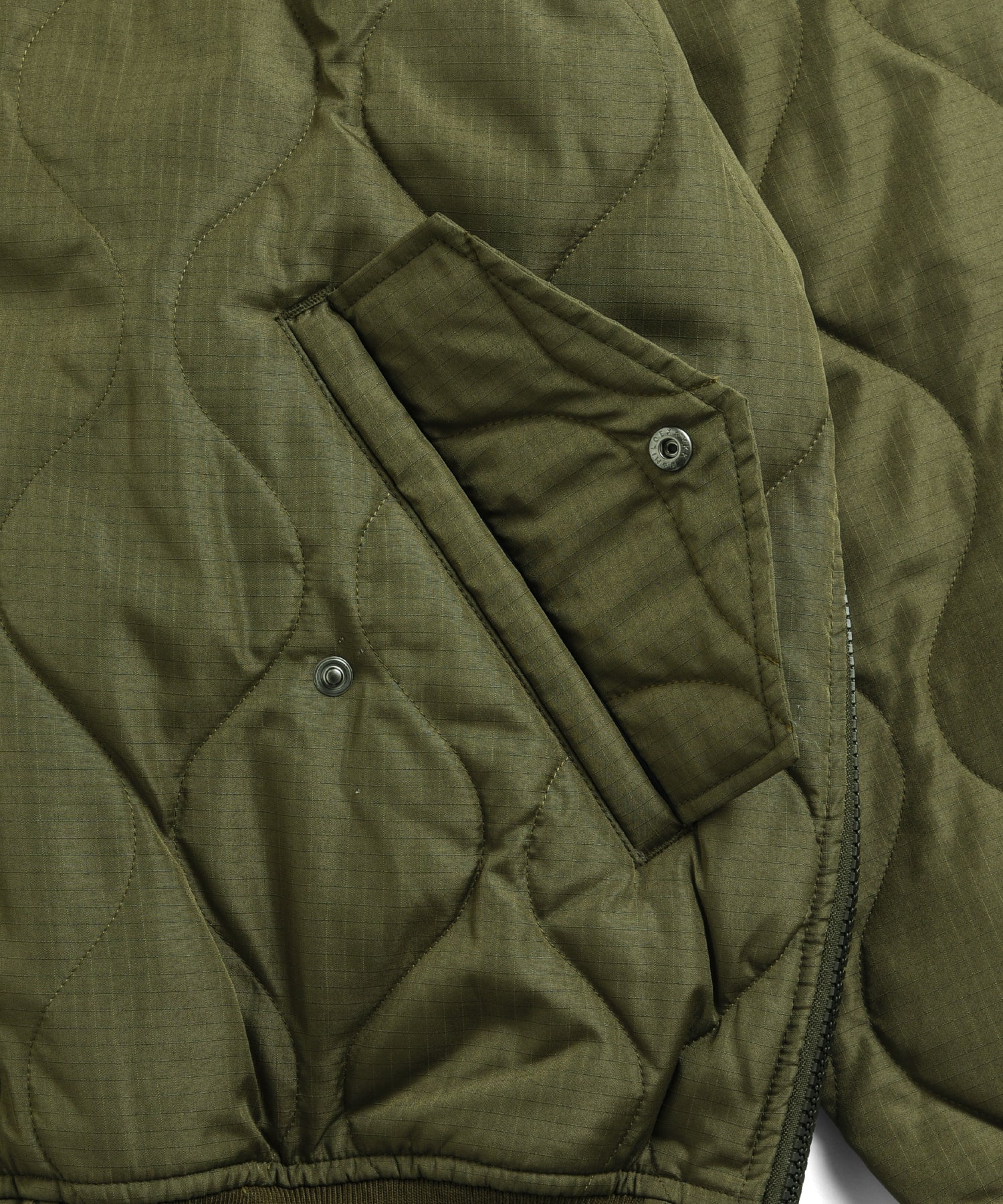 Functional pocket detail of Taion Military MA-1 Type Down Jacket in Olive with secure storage design