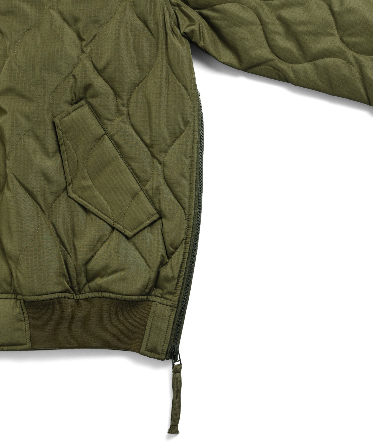 Side slit zipper detail of Taion Military MA-1 Type Down Jacket in Olive for improved mobility and comfort