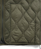Pocket detail of Taion Military V Neck W-Zip Down Jacket in Olive with functional handwarmer storage design