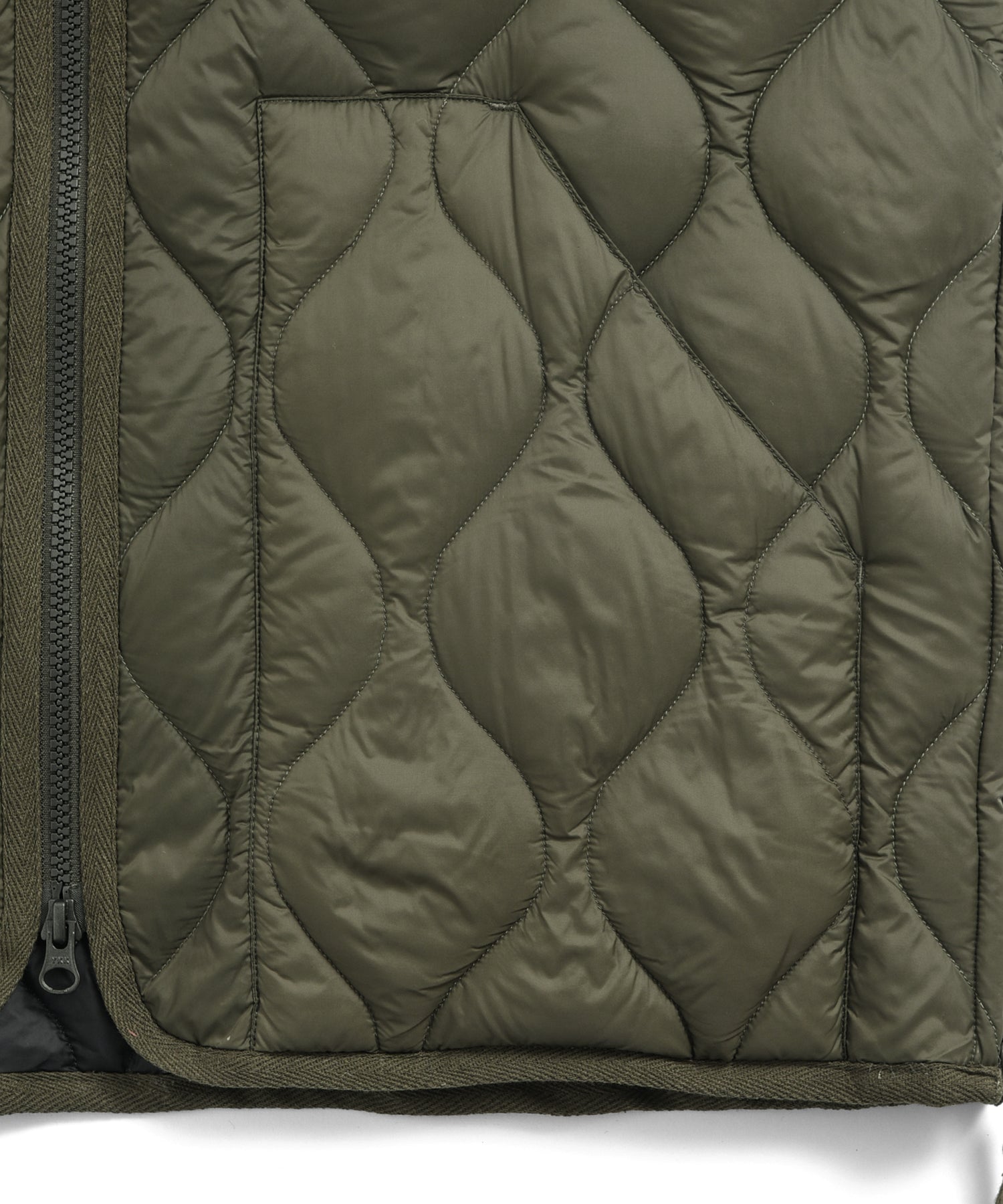 Pocket detail of Taion Military V Neck W-Zip Down Jacket in Olive with functional handwarmer storage design