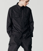 Taion Non Down Military Long Sleeve Shirt in Black – lightweight utility fabric with adjustable side fit and everyday comfort