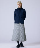 Model wearing Taion Unisex Military Zip V Neck Down Jacket in D.Navy