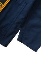Dark navy twill chore shirt lifestyle view premium workwear utility shirt modern streetwear outfit